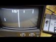 Two vintage "Pong" video game consoles